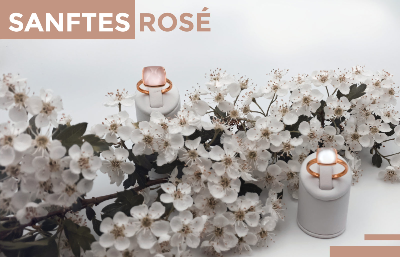 Neuigkeiten: "Sanftes Rose" - Zwei Ringe aus Rosegold mit Farbsteinen an Apfelbaumblüten dekoriert